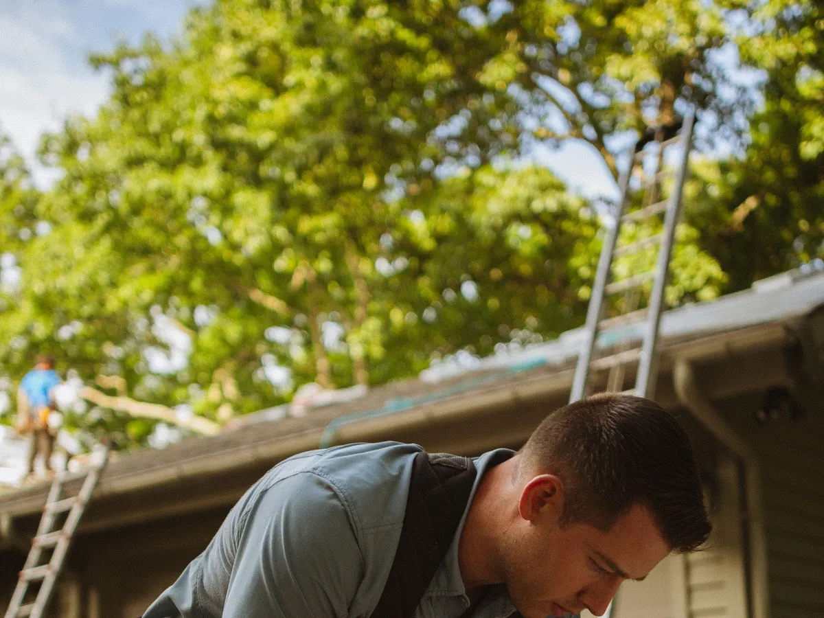 Carpenter working with a saw
